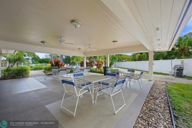 OWNER FINANCING AVAILABLE... EV ELECTRIC CHARGER  installed in on Palm-Aire Country Club and Resort - Palms in Florida - for sale on GolfHomes.com, golf home, golf lot