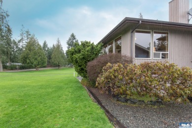 Watch the golf course right out of your living room windows! on SunLand Golf and Country Club in Washington - for sale on GolfHomes.com, golf home, golf lot