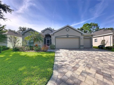 Fabulous St Regis model with  2.5 car garage located on The on Kings Ridge Golf Club in Florida - for sale on GolfHomes.com, golf home, golf lot