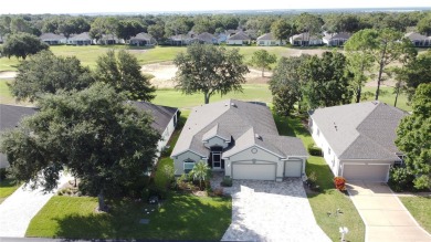 Fabulous St Regis model with  2.5 car garage located on The on Kings Ridge Golf Club in Florida - for sale on GolfHomes.com, golf home, golf lot
