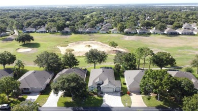 Fabulous St Regis model with  2.5 car garage located on The on Kings Ridge Golf Club in Florida - for sale on GolfHomes.com, golf home, golf lot