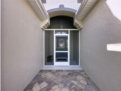 Fabulous St Regis model with  2.5 car garage located on The on Kings Ridge Golf Club in Florida - for sale on GolfHomes.com, golf home, golf lot