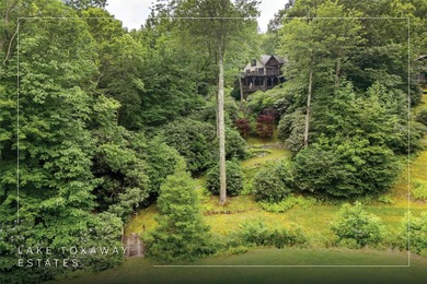 This one-of-a-kind, beautifully maintained four-bedroom on Lake Toxaway Country Club in North Carolina - for sale on GolfHomes.com, golf home, golf lot