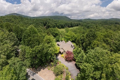 This one-of-a-kind, beautifully maintained four-bedroom on Lake Toxaway Country Club in North Carolina - for sale on GolfHomes.com, golf home, golf lot