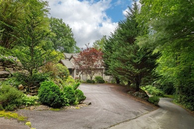 This one-of-a-kind, beautifully maintained four-bedroom on Lake Toxaway Country Club in North Carolina - for sale on GolfHomes.com, golf home, golf lot