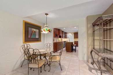 ABSOLUTELY GORGEOUS TOWNHOUSE | PRESTIGIOUS BOCA POINTE | QUICK on Boca Pointe Country Club in Florida - for sale on GolfHomes.com, golf home, golf lot