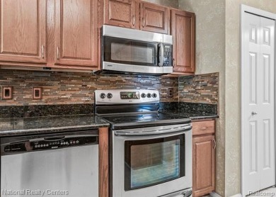 You won't be disappointed as this stunning 2 bedroom, 2.5 bath on Pheasant Run Golf Club in Michigan - for sale on GolfHomes.com, golf home, golf lot