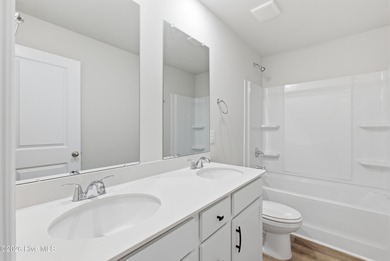 The Kent floor plan offers a spacious and versatile living space on Harbour Point Golf Club in North Carolina - for sale on GolfHomes.com, golf home, golf lot