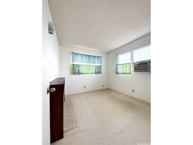 E Komo Mai to NEWTOWN ESTATES. Centrally located and minutes on Pearl Country Club in Hawaii - for sale on GolfHomes.com, golf home, golf lot