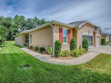 Enjoy maintenance-free living in this spacious 2-bedroom, 2-bath on Arlington Ridge Golf Club in Florida - for sale on GolfHomes.com, golf home, golf lot