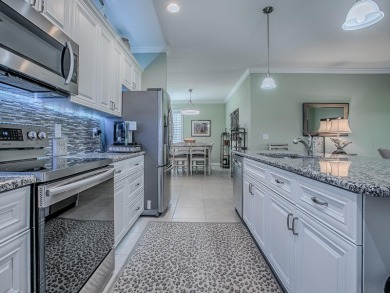 Enjoy maintenance-free living in this spacious 2-bedroom, 2-bath on Arlington Ridge Golf Club in Florida - for sale on GolfHomes.com, golf home, golf lot