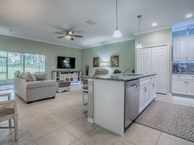 Enjoy maintenance-free living in this spacious 2-bedroom, 2-bath on Arlington Ridge Golf Club in Florida - for sale on GolfHomes.com, golf home, golf lot