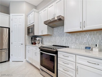 This beautifully crafted home in The Plantation Golf  Country on The Plantation Golf and Country Club in Florida - for sale on GolfHomes.com, golf home, golf lot