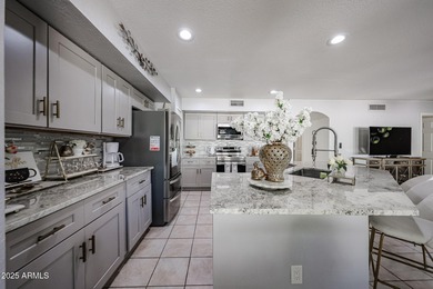 Beautifully updated 4-bedroom, 2.5-bath home in desirable on Arrowhead Country Club in Arizona - for sale on GolfHomes.com, golf home, golf lot