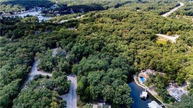 Situated on a generous .53-acre parcel in the prestigious Porto on The Club At Porto Cima in Missouri - for sale on GolfHomes.com, golf home, golf lot