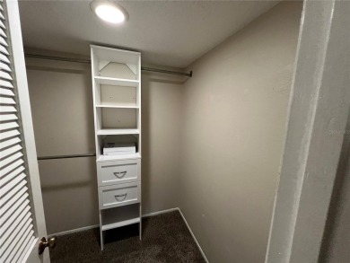 Welcome to this inviting first-floor, 2-bedroom, 2-bath condo in on East Lake Woodlands Country Club in Florida - for sale on GolfHomes.com, golf home, golf lot