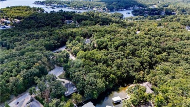 Situated on a generous .53-acre parcel in the prestigious Porto on The Club At Porto Cima in Missouri - for sale on GolfHomes.com, golf home, golf lot