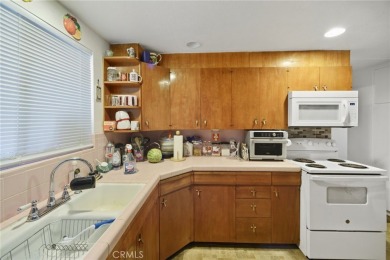 Welcome to 1461 W Westmont Ave, located in the Panorama Village on Panorama Village Golf Course in California - for sale on GolfHomes.com, golf home, golf lot