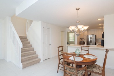 Welcome home to this beautiful end unit townhome in the heart of on Abacoa Golf Club in Florida - for sale on GolfHomes.com, golf home, golf lot