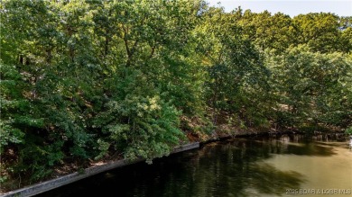 Situated on a generous .53-acre parcel in the prestigious Porto on The Club At Porto Cima in Missouri - for sale on GolfHomes.com, golf home, golf lot