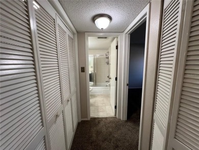 Welcome to this inviting first-floor, 2-bedroom, 2-bath condo in on East Lake Woodlands Country Club in Florida - for sale on GolfHomes.com, golf home, golf lot