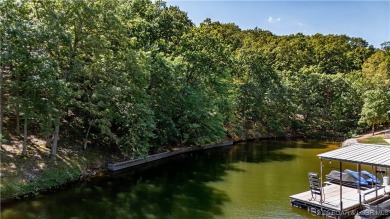 Situated on a generous .53-acre parcel in the prestigious Porto on The Club At Porto Cima in Missouri - for sale on GolfHomes.com, golf home, golf lot