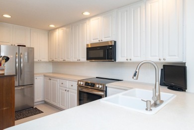 Welcome home to this beautiful end unit townhome in the heart of on Abacoa Golf Club in Florida - for sale on GolfHomes.com, golf home, golf lot