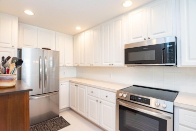 Welcome home to this beautiful end unit townhome in the heart of on Abacoa Golf Club in Florida - for sale on GolfHomes.com, golf home, golf lot