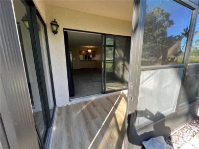 Welcome to this inviting first-floor, 2-bedroom, 2-bath condo in on East Lake Woodlands Country Club in Florida - for sale on GolfHomes.com, golf home, golf lot