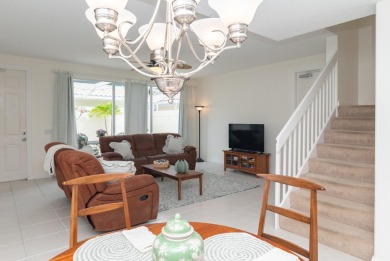 Welcome home to this beautiful end unit townhome in the heart of on Abacoa Golf Club in Florida - for sale on GolfHomes.com, golf home, golf lot