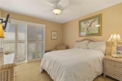 Winding tree-lined roads lead to Sea Grape Villas, where this on Bird Bay Executive Golf Club in Florida - for sale on GolfHomes.com, golf home, golf lot