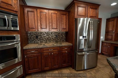 Located in Riverside neighborhood close to elementary, middle on Riverside Country Club in Nebraska - for sale on GolfHomes.com, golf home, golf lot