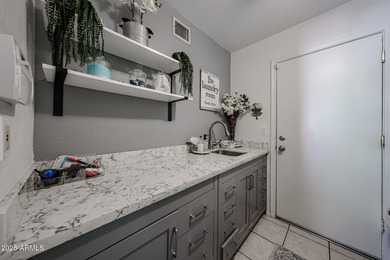 Beautifully updated 4-bedroom, 2.5-bath home in desirable on Arrowhead Country Club in Arizona - for sale on GolfHomes.com, golf home, golf lot