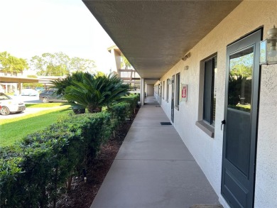 Welcome to this inviting first-floor, 2-bedroom, 2-bath condo in on East Lake Woodlands Country Club in Florida - for sale on GolfHomes.com, golf home, golf lot