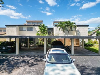 Winding tree-lined roads lead to Sea Grape Villas, where this on Bird Bay Executive Golf Club in Florida - for sale on GolfHomes.com, golf home, golf lot