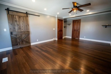 Located in Riverside neighborhood close to elementary, middle on Riverside Country Club in Nebraska - for sale on GolfHomes.com, golf home, golf lot