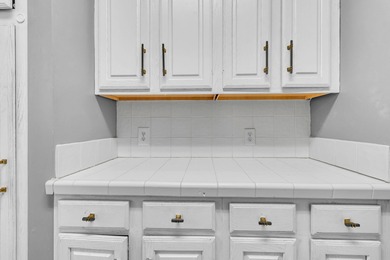 Welcome to 4206 Sawgrass Drive -- an elegant 4-bedroom, 3.5-bath on Coosaw Creek Country Club in South Carolina - for sale on GolfHomes.com, golf home, golf lot