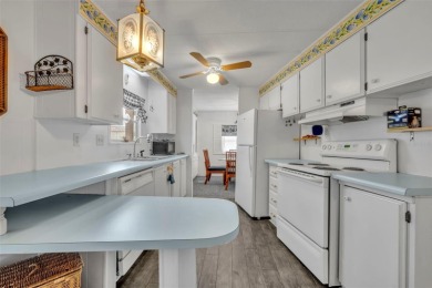 Welcome to the 55+ Molokai Co-Op Mobile Home Park! This turnkey on Lakes at Leesburg Golf Course in Florida - for sale on GolfHomes.com, golf home, golf lot