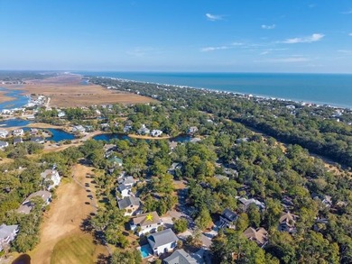Discover the ultimate coastal retreat in this stunning custom on The Plantation Course At Edisto in South Carolina - for sale on GolfHomes.com, golf home, golf lot