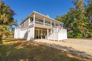 Discover the ultimate coastal retreat in this stunning custom on The Plantation Course At Edisto in South Carolina - for sale on GolfHomes.com, golf home, golf lot