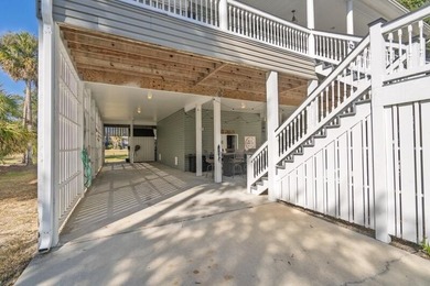 Discover the ultimate coastal retreat in this stunning custom on The Plantation Course At Edisto in South Carolina - for sale on GolfHomes.com, golf home, golf lot