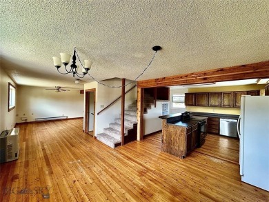 Incredible potential with this 4 bedroom - 2.5 bath home on TWO on Madison Meadows Golf Course in Montana - for sale on GolfHomes.com, golf home, golf lot