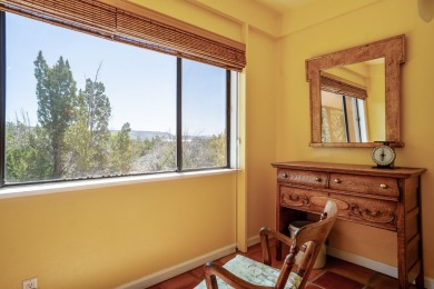 Nestled privately among Pinon and Juniper trees at Cochiti Lake on Pueblo de Cochiti Golf Course in New Mexico - for sale on GolfHomes.com, golf home, golf lot