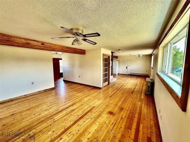 Incredible potential with this 4 bedroom - 2.5 bath home on TWO on Madison Meadows Golf Course in Montana - for sale on GolfHomes.com, golf home, golf lot