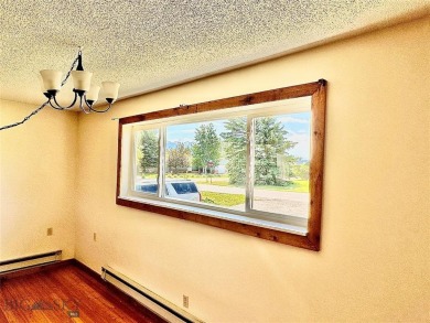 Incredible potential with this 4 bedroom - 2.5 bath home on TWO on Madison Meadows Golf Course in Montana - for sale on GolfHomes.com, golf home, golf lot