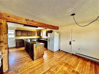 Incredible potential with this 4 bedroom - 2.5 bath home on TWO on Madison Meadows Golf Course in Montana - for sale on GolfHomes.com, golf home, golf lot
