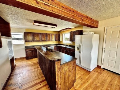 Incredible potential with this 4 bedroom - 2.5 bath home on TWO on Madison Meadows Golf Course in Montana - for sale on GolfHomes.com, golf home, golf lot