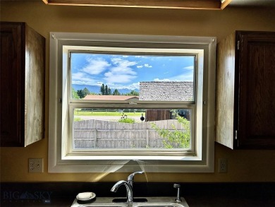 Incredible potential with this 4 bedroom - 2.5 bath home on TWO on Madison Meadows Golf Course in Montana - for sale on GolfHomes.com, golf home, golf lot