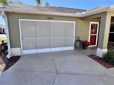 This three bedroom and two bath Anaheim courtyard villa will on Yankee Clipper Executive Golf Course in Florida - for sale on GolfHomes.com, golf home, golf lot