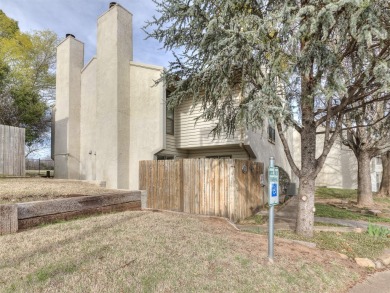Location is key for this cozy townhome at 825 Cardinal Creek on Jimmie Austin OU Golf Club in Oklahoma - for sale on GolfHomes.com, golf home, golf lot